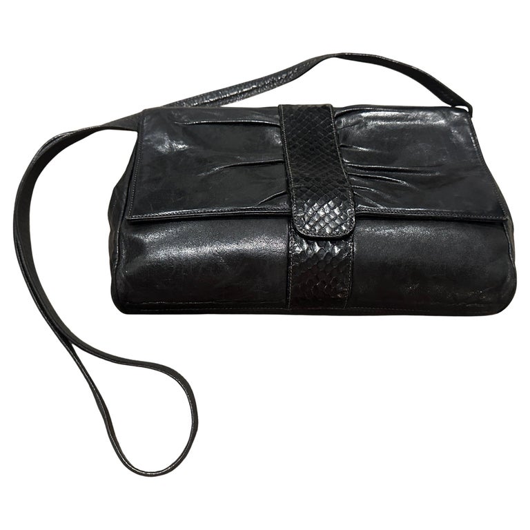 An Elegant 1960s Black Leather Shoulder Bag by Gucci