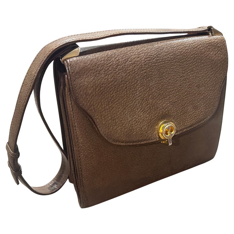 An Elegant 1970s Brown Leather and Brass Hardware Shoulder Bag by Gucci