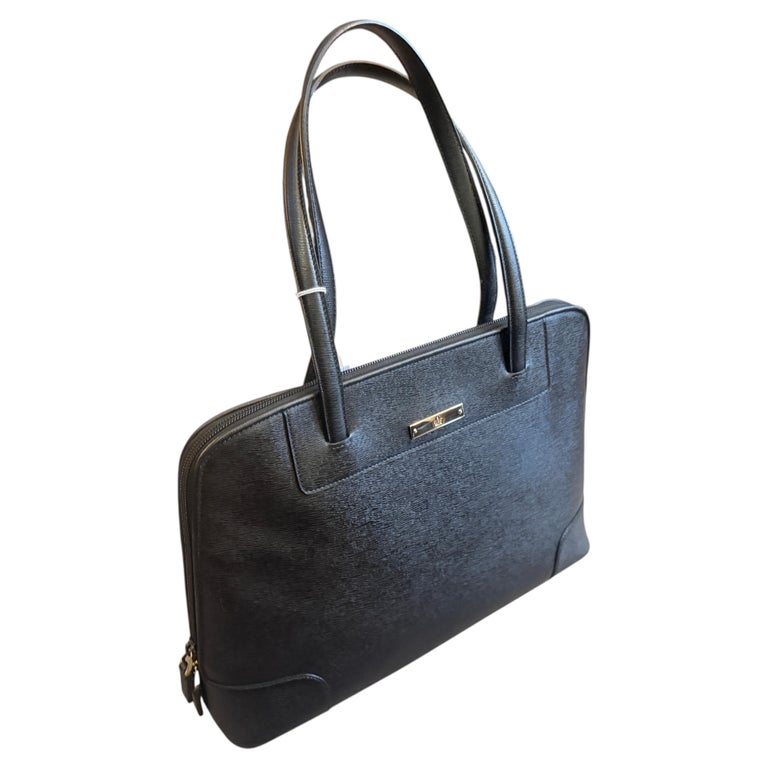 A 1990s Gucci Black Textured Leather and Brass Hardware shoulder Bag