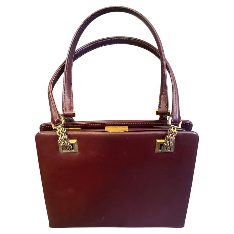 A 1960s Gucci Vintage Red Leather and Brass Hardware Evening Bag