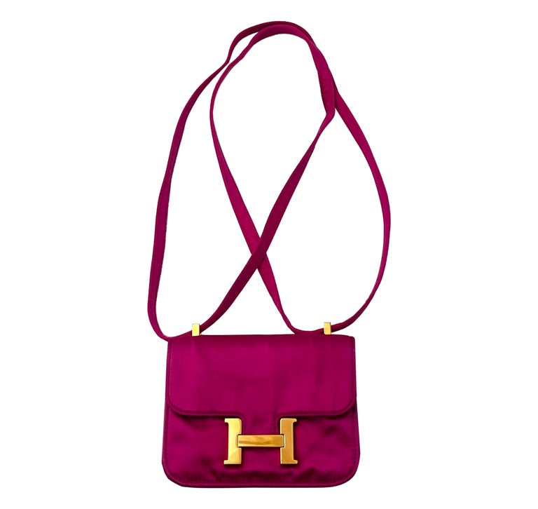 Hermès Mini Constance pink satin.