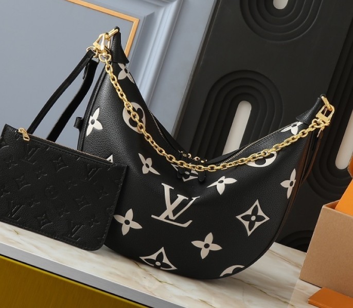 Louis Vuitton Reissue Louis Vuitton Bicolor Monogram Empreinte Loop Hobo Bag In Black And Cream