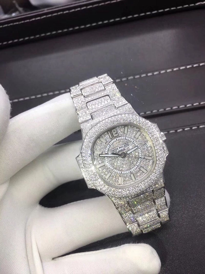 Patek Philippe Women's Sporty Elegance Nautilus 37mm Diamond Plate Steel Strap Top CollectWatch Model 7021/1G-001