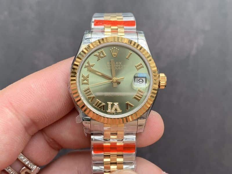 I don't have the original title to rewrite. You've provided the required strings that must remain unchanged (Rolex imitation watches logotype 31mm automatic mechanical intermediate gold women's) and context, but not the current title. Could you provide the original blog title you'd like me to rewrite?