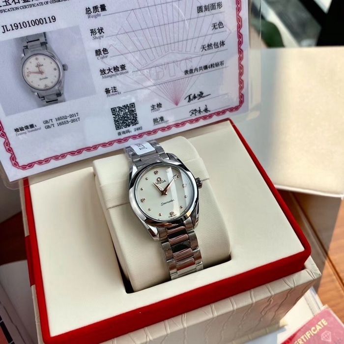 Réplica superior de reloj Omega Reloj de pulsera con banda de acero de la serie Seamaster con placa blanca para mujer Omega y diamantes brillantes