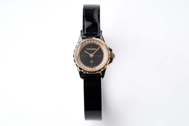 top-tier replicaChanel women's black dial black belt J12 series quartzleather strap watch front view