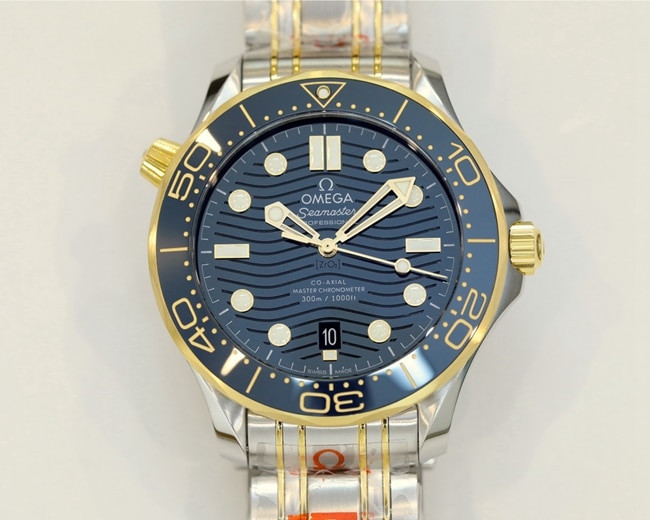 Top Super Clone Omega Men's Blue Dial Steel Bracelet Seamaster 300M Mechanical Watch with Laser-Engraved Wave Pattern
