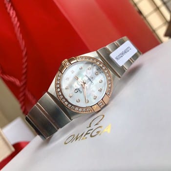 ¿Cuánto cuesta una pieza de imitación omega, relojes mecánicos de mujer con platillo omega?
