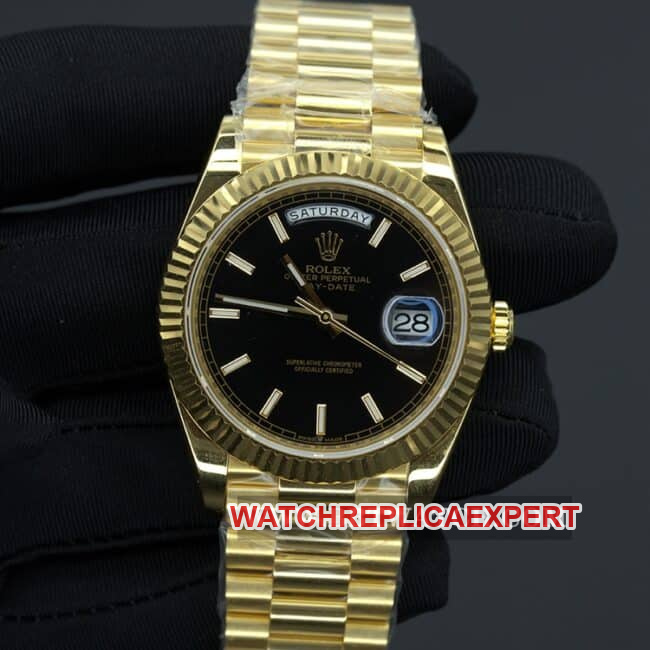 Rolex top Collectwatches men's black plate gold band double calendar automatic mechanical front view