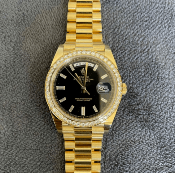 Rolex Day-Date m228348rbr-0039: 18-Karat-Goldgehäuse, schwarzes Zifferblatt und Diamantdetails, Bilder und Preisführer
