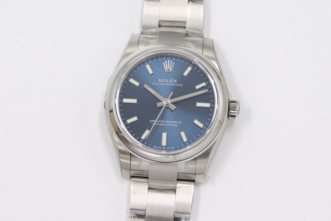 Réplique EW Rolex Oyster Perpetual Rolex avec cadran bleu glacier, bracelet en acier 31 mm, mouvement importé, réf. m277200-0003